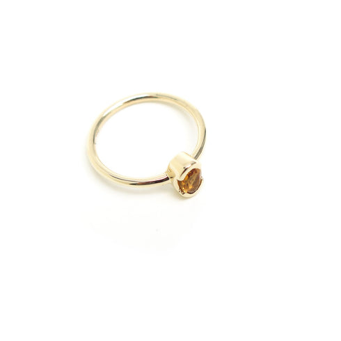 Partial Bezel Set Oval Citrine Ring in Yellow Gold